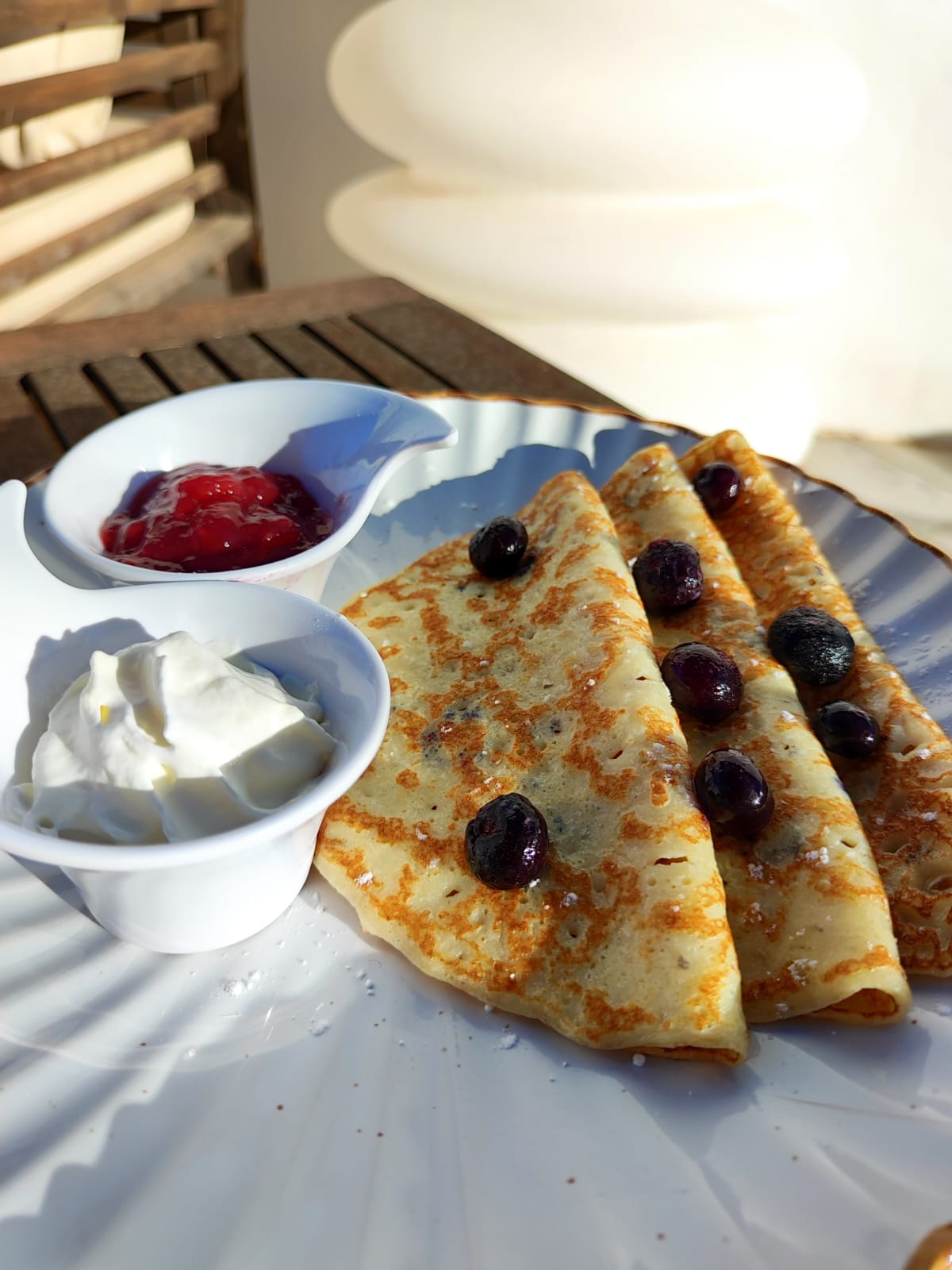 Blueberry crêpes with jam & cream